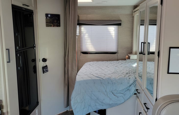 Bedroom with privacy curtains