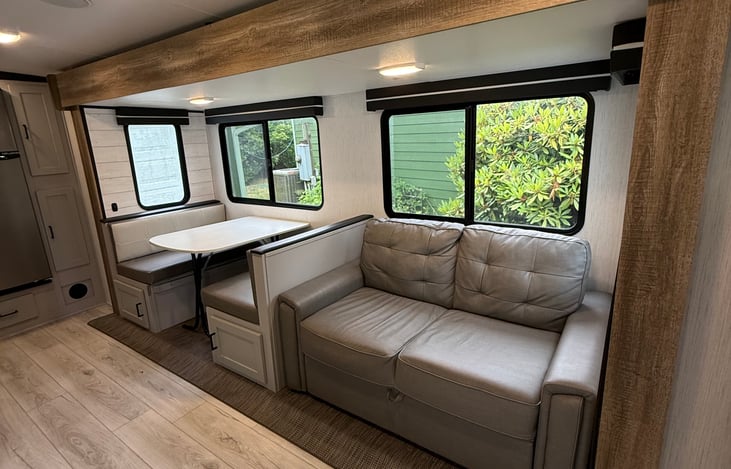 Cozy place to curl up and enjoy the view out all these windows