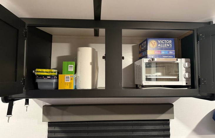 Cleaning supplies, toaster oven and assortment of coffee pods provided