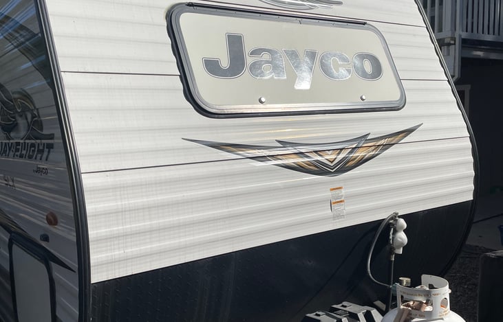 Front of the trailer. The Jayco sign can be unlocked and lifted however, the window cannot be opened. It does allow for you to see the view from the bedroom, and adds extra light.