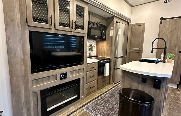 Kitchen area with fireplace