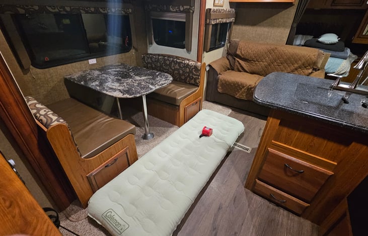 One person air bed, can be cot to elevate off the floor.