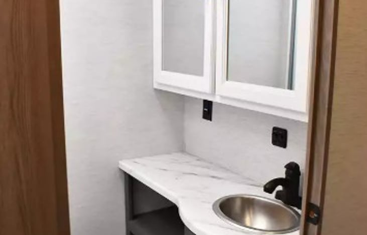 Full Vanity and Sink in Bathroom