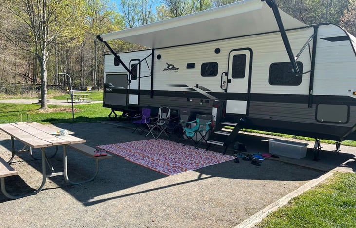 Exterior comfort with a large awning.
