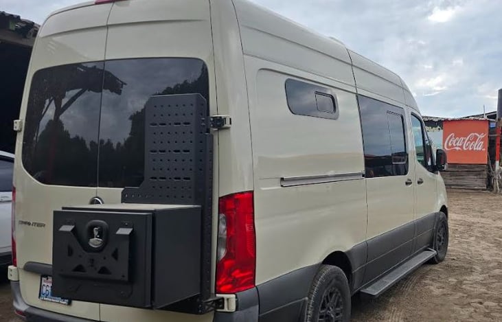 Side steps and exterior storage locker for anything wet or muddy