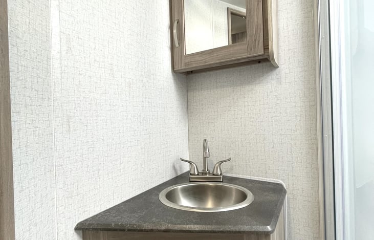 Bathroom sink and medicine cabinet