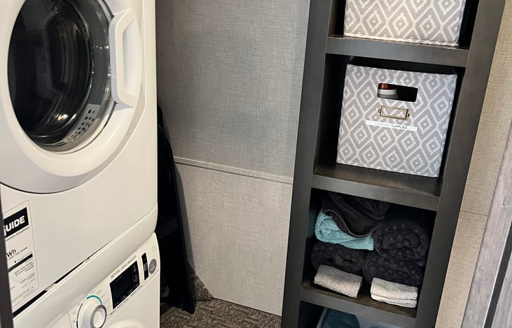 Walk-in closet with washer and dryer
