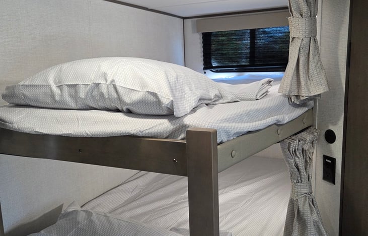 Bunk bed area, bedding provided