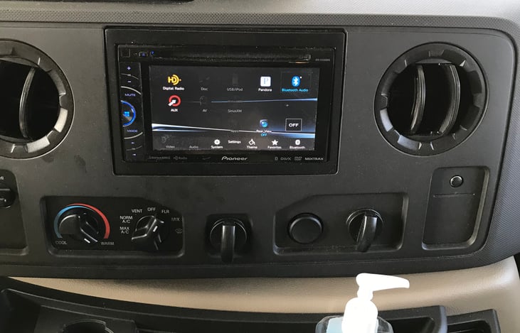 Bluetooth touch screen radio/CD player.  Rear and side view camera screen.
