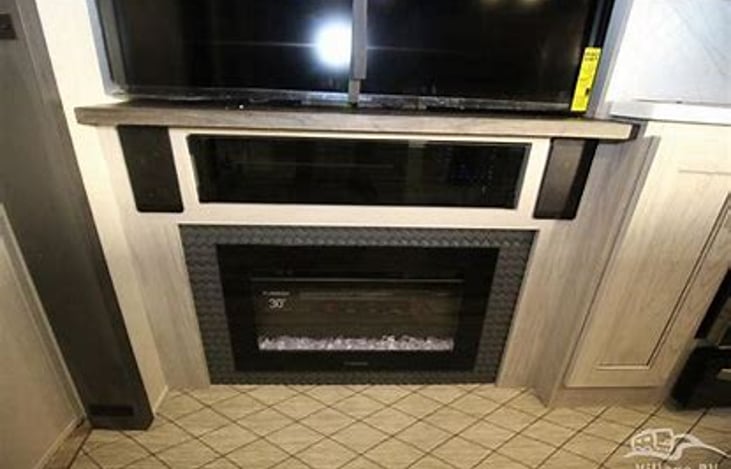 Fireplace, TV, DVD/Blueray, and Stereo that can play tunes for you outside and in.