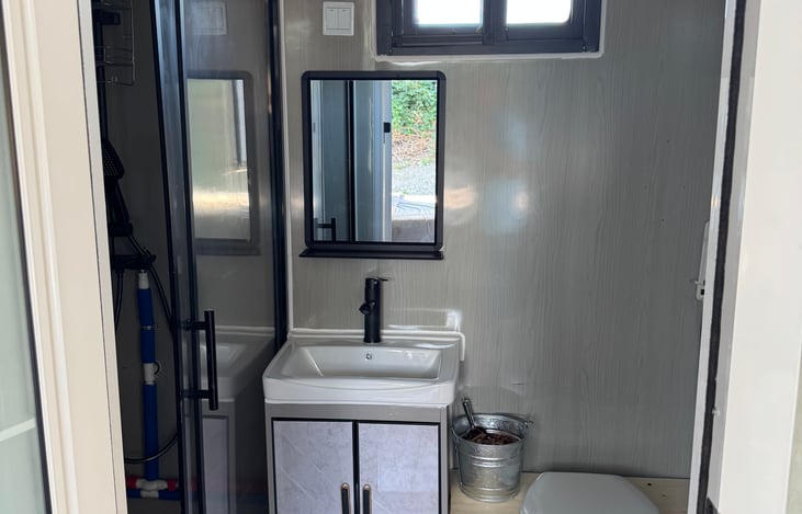 Eco friendly composting toilet