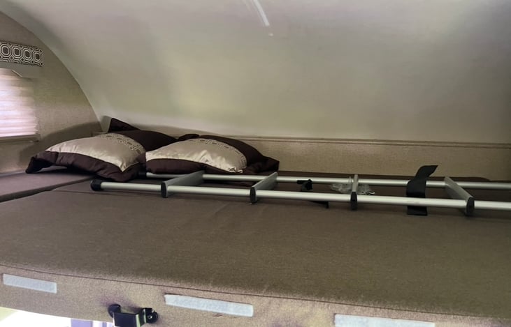 Above cab bunk with ladder