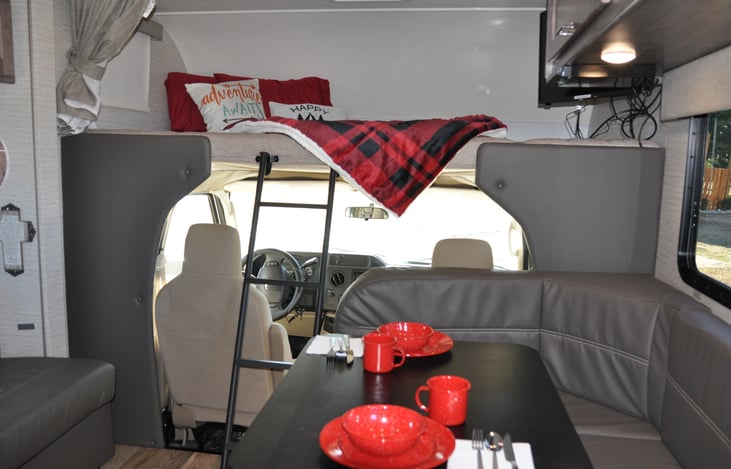 Queen bunk above cab