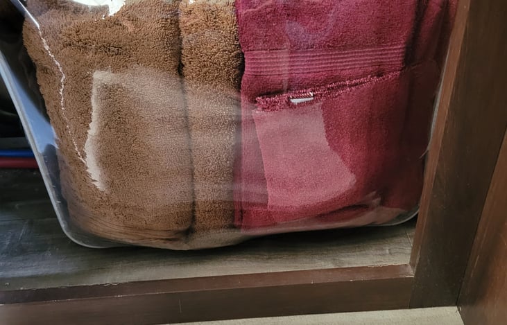 Bathroom vanity, towels and washcloths provided.