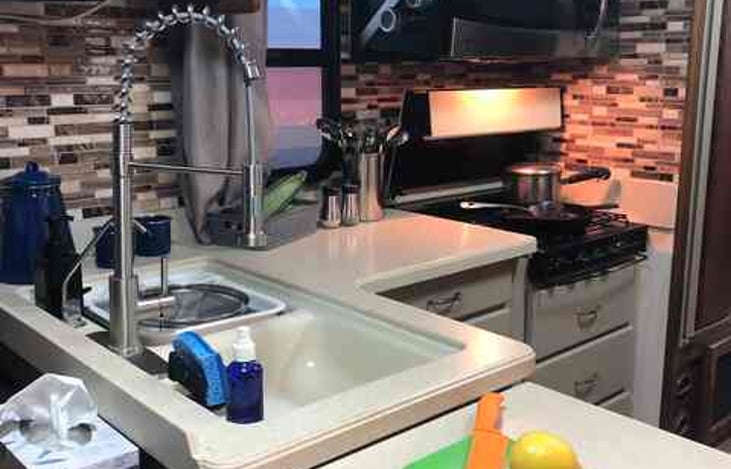 Microwave, 3-burner gas stove, sprayer faucet