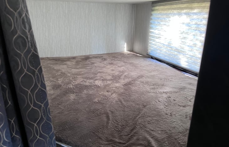 Bunk bed. Each bunk has lights and plug ins.