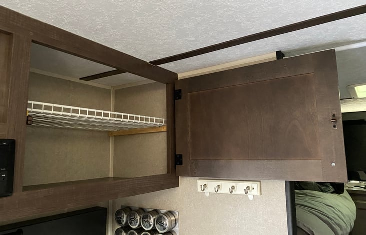 Kitchen: Above sink storage