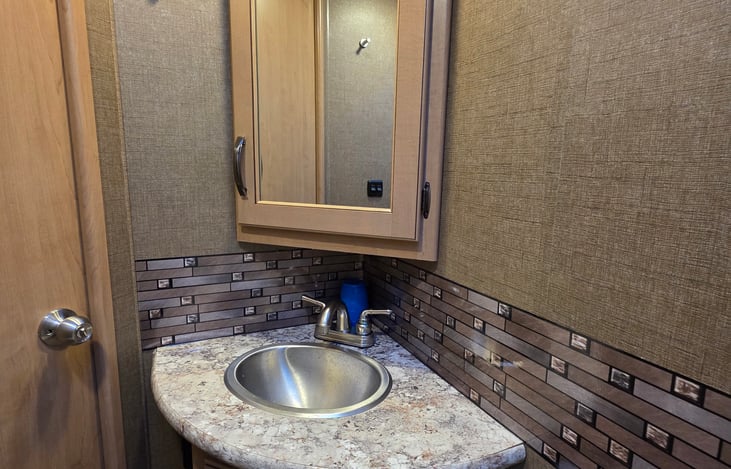 Bathroom sink with cabinet
