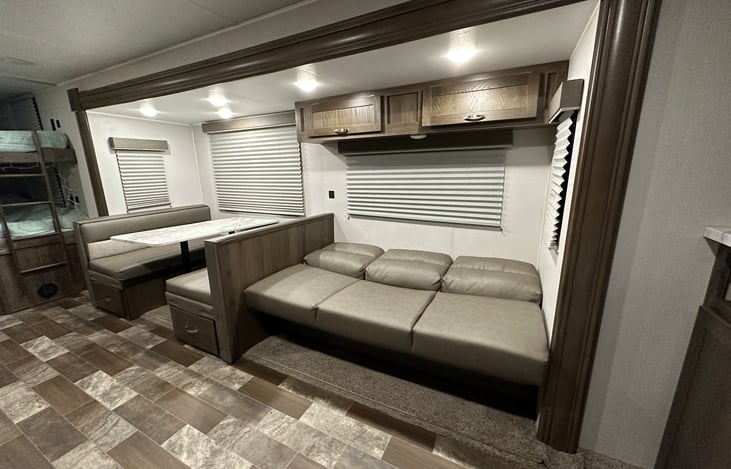 Seating area converts to bed (actual image)