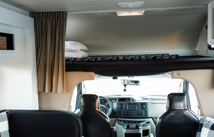 Cozy sleeping area / children's hangout above the cab