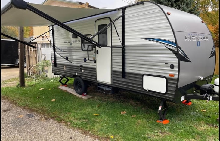 Three storage compartments. Two in the front is 16 feet by 24 connected plenty of space for anything from chairs to anything you want to store. The third one is for sewer hose and other items.