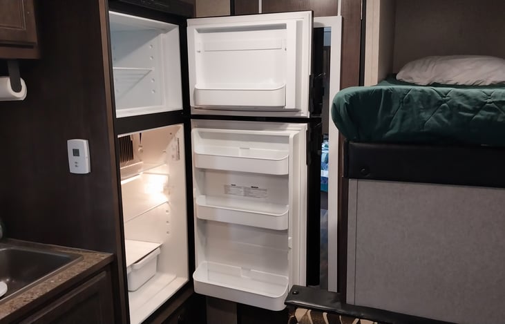 This 8 cubic-foot refrigerator/freezer is larger than any other refrigerator/freezer you are likely to find in this sized trailer. It really holds a lot of food!