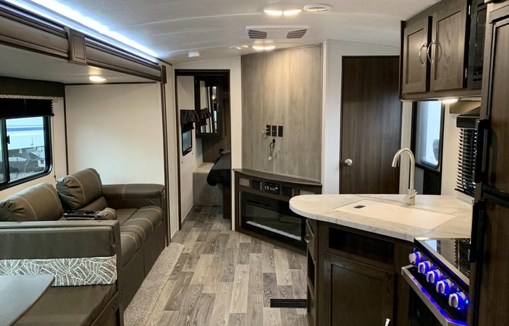 The TV is not pictured, but it is included with the rental.