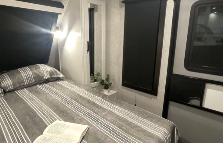 Private bedroom with queen size bed, dual wardrobes and a closet. Pillows and blankets provided. Additional storage under bed