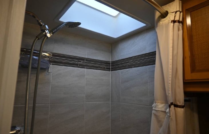 Custom ceramic tile shower rarely found in small RVs