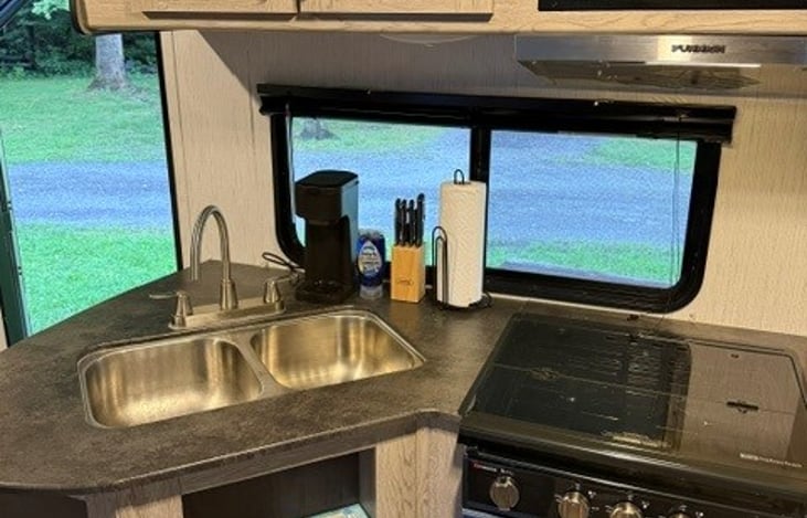 Kitchen. Gas stove/oven. Provided cutlery and K-Cup coffee maker.