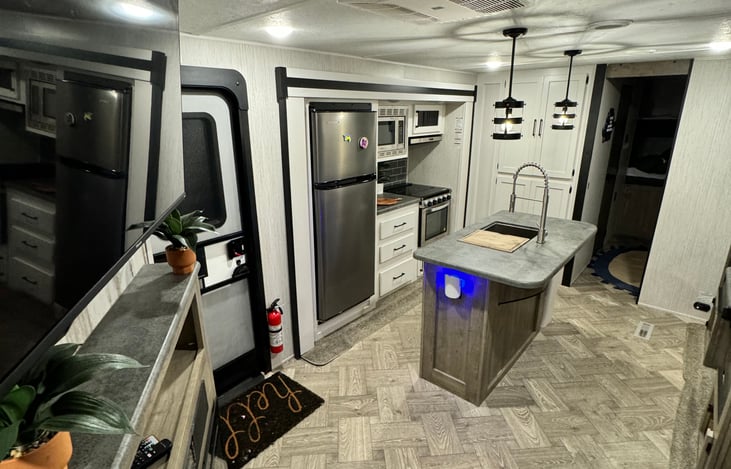 Very spacious kitchen/living room area. Plenty of room and Roku TV to entertain!