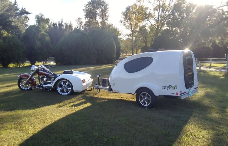 This unit is very easy to pulled with a small car or try I use it myself and have traveled probably over 50,000 miles plus behind my trike I have rented it out several times and have had no complanced