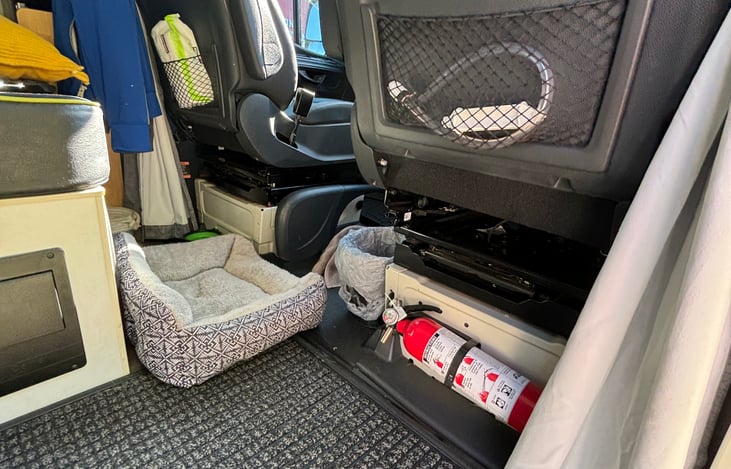 Fire extinguisher and net cubby