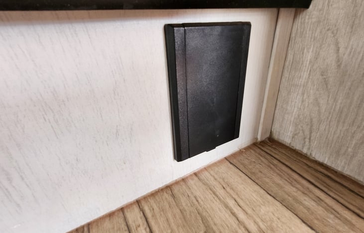 In-floor vacuum system hose connection is located on the stair step.