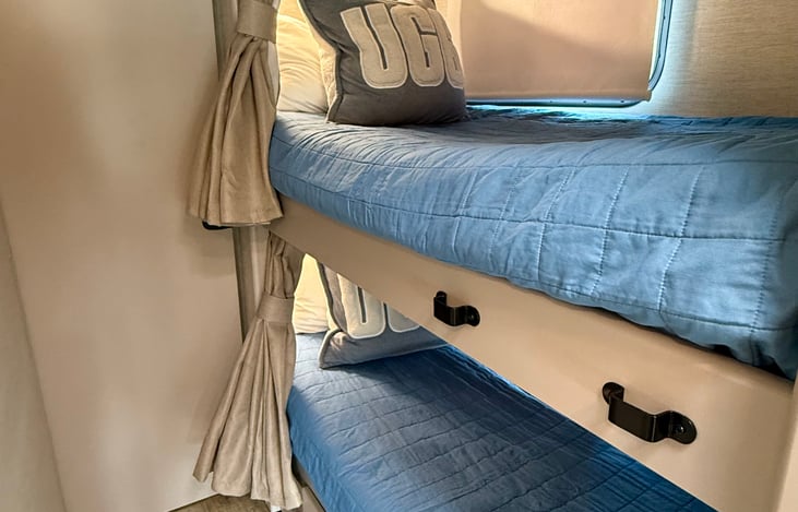 Door separating bunks & main bed