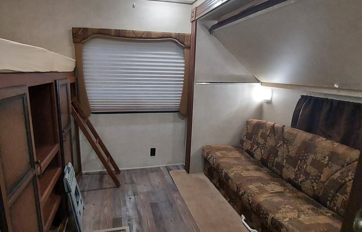 Bunk Area with Upper Bunk up to make more room for Couch