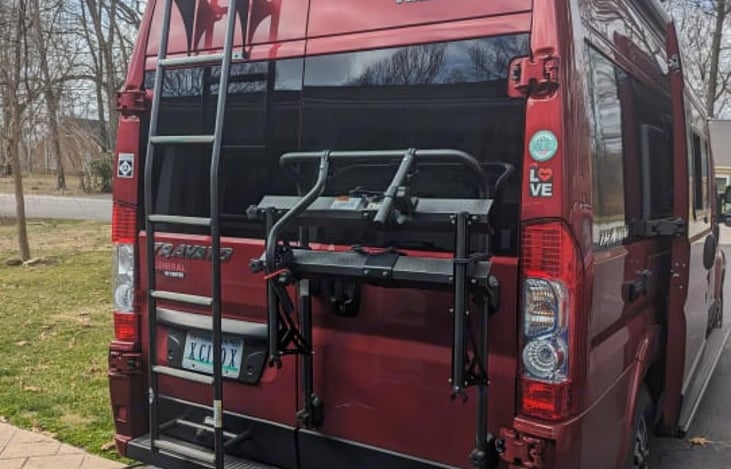 Rear with movable ladder and bike rack