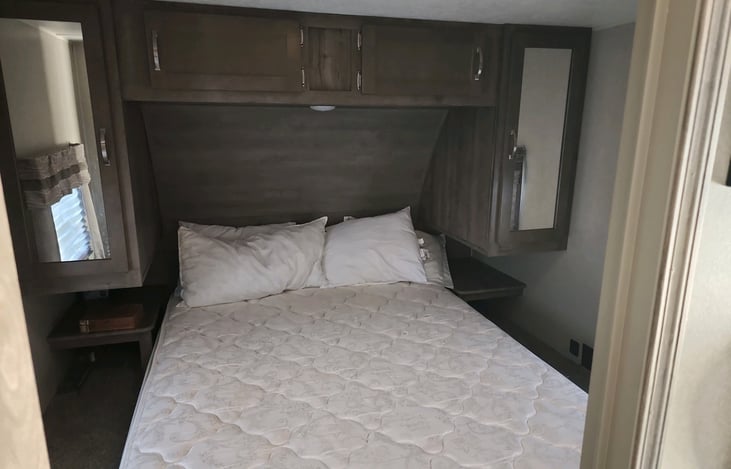 Extremely comfortable King-sized bed in private bedroom.