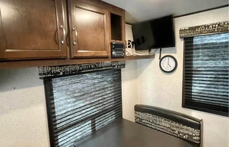 4 person dinette has storage underneath both benches and easily converts to a bed.