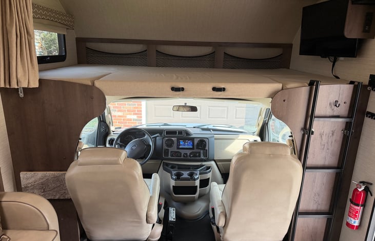 Cab-over bunk with tv. Roku, dvd player and PlayStation included.