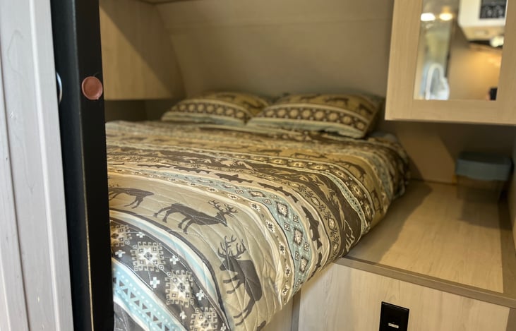 Master Bed with a closet area for plenty of clothes.