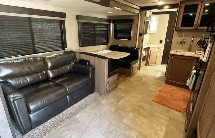 Couch turns into a decently comfortable bed, table is able to convert as well.