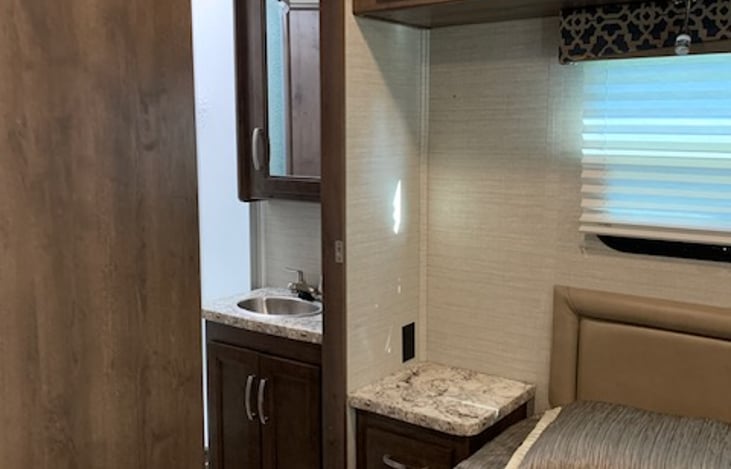 area between bathroom and queen bedroom