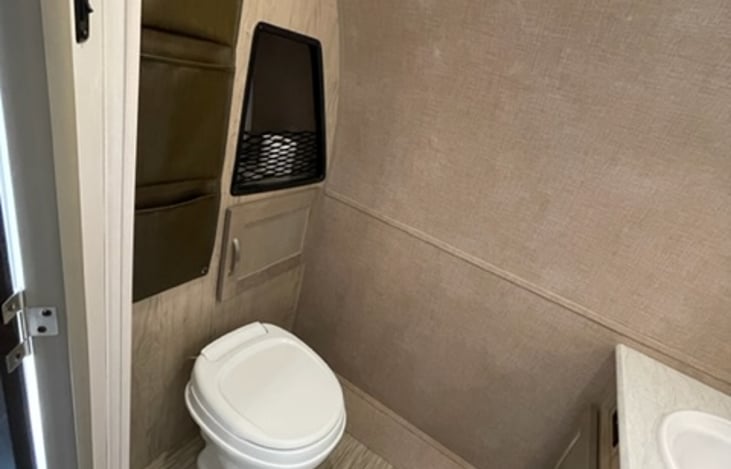 Whether starting your day or winding down, this bathroom offers a refreshing experience on your travel adventures.