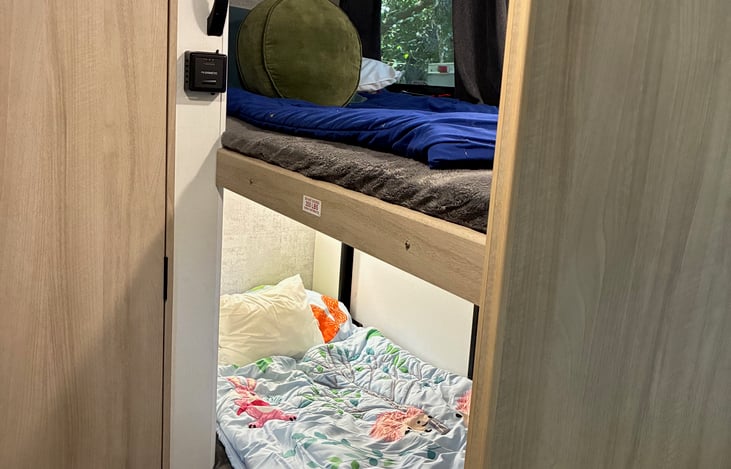 Two twin sized bunks! Lower bunk folds up during transport to allow space for more cargo.