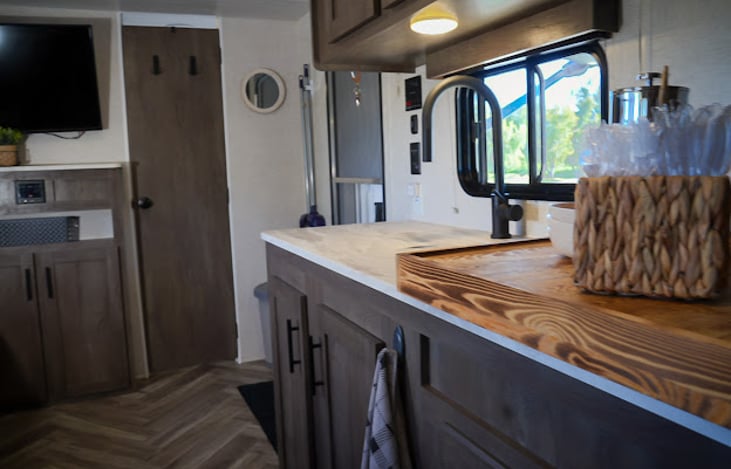 Every rental includes plenty of disposable plates, napkins, and silverware as well as washable items. Stove and sink are  equipped with covers to provide  additional counter-space when needed.