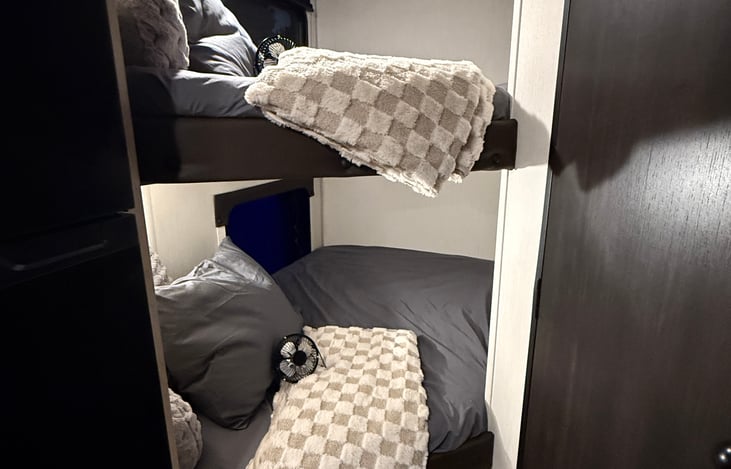Bunks - new bedding and pillows. Mini usb fan included in each bunk. Dedicated light and usb charger in each bunk.