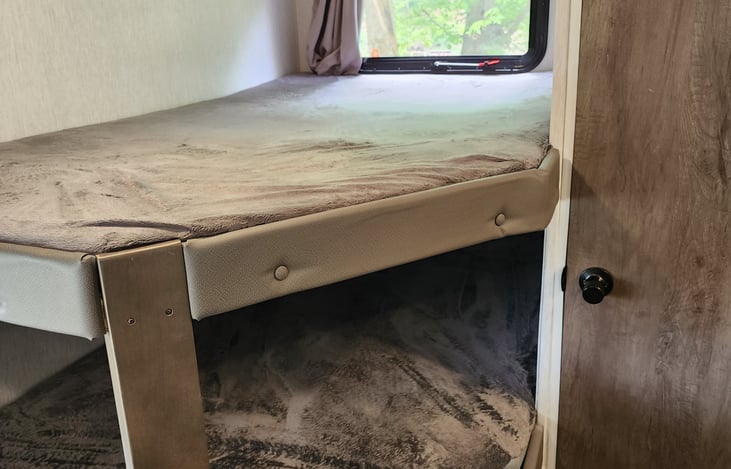 2 bunks. Each has a light and usb port, plus a privacy curtain. 

TV can swing around for tv watching from the bunks. Kids love it!