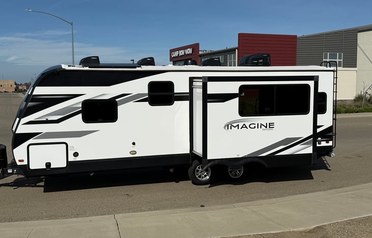 Large slide out on the drivers side. This is where the table sits inside, making it very spacious.