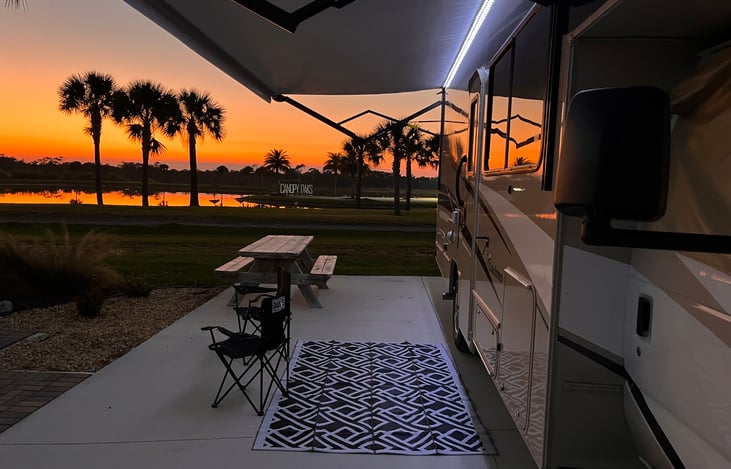 Awning and patio lights create a nice atmosphere on the patio.